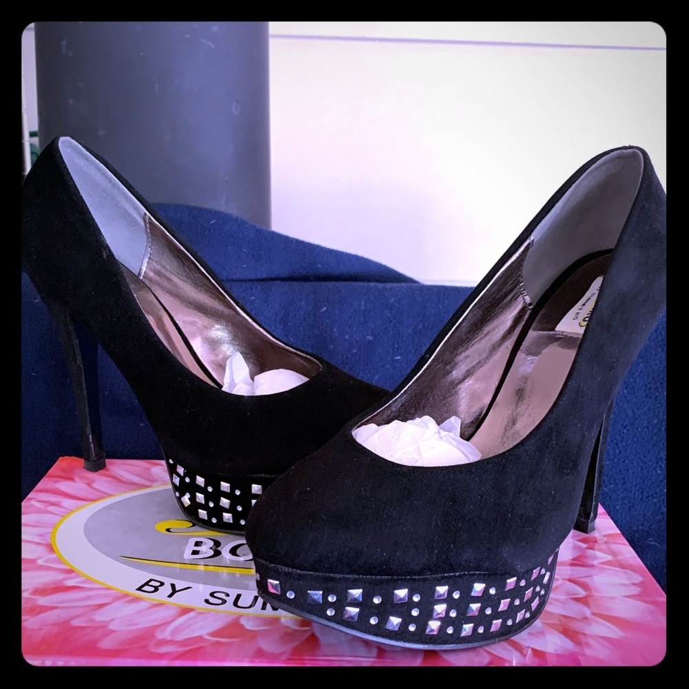 Black suede platform shoes by Summer Rio